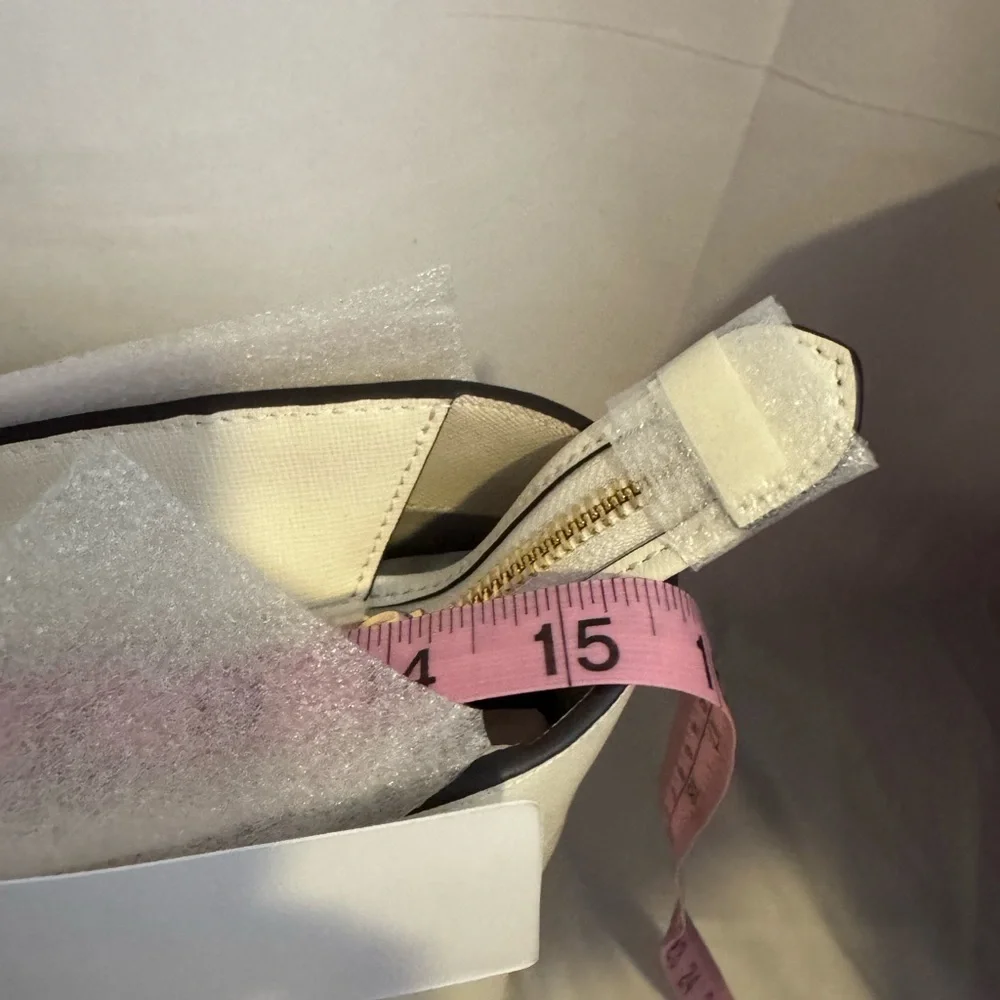 kate spade Cream Tote with Decorative Cutouts and Scarf Accent
